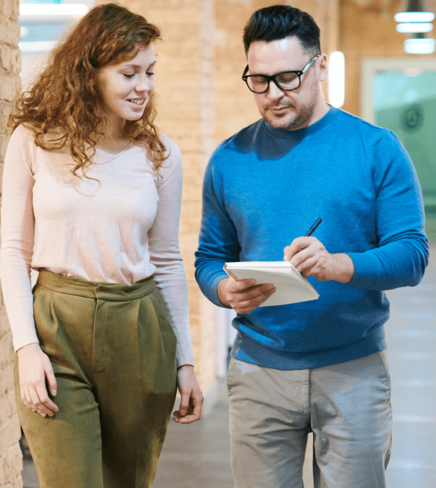 Writing note closer to woman